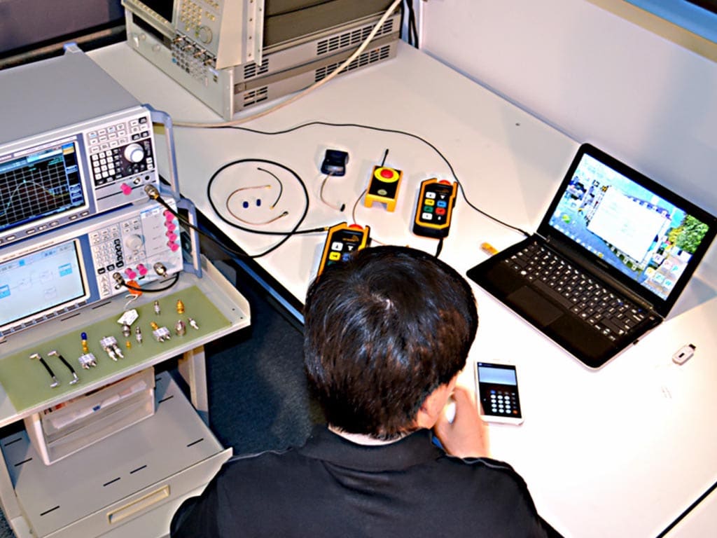 Samanth Mottera working on KEROSYS aircraft and electronics in the laboratory